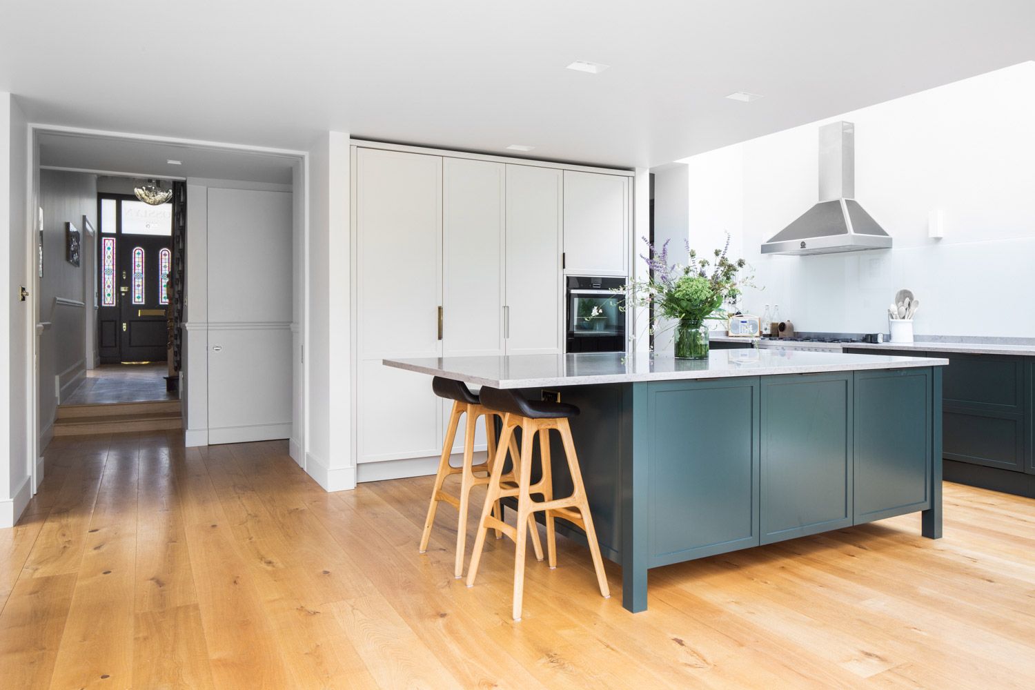 The kitchen is modern and minimalistic